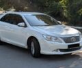 Белый Тойота Камри, объемом двигателя 2.49 л и пробегом 243 тыс. км за 13250 $, фото 1 на Automoto.ua