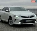 Белый Тойота Камри, объемом двигателя 2.49 л и пробегом 171 тыс. км за 15300 $, фото 1 на Automoto.ua