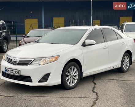 Білий Тойота Камрі, об'ємом двигуна 2.49 л та пробігом 252 тис. км за 8990 $, фото 1 на Automoto.ua