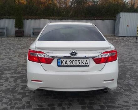 Белый Тойота Камри, объемом двигателя 2.5 л и пробегом 235 тыс. км за 13200 $, фото 2 на Automoto.ua