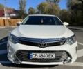 Белый Тойота Камри, объемом двигателя 2.5 л и пробегом 174 тыс. км за 14400 $, фото 1 на Automoto.ua
