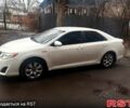 Белый Тойота Камри, объемом двигателя 2.5 л и пробегом 300 тыс. км за 12500 $, фото 1 на Automoto.ua