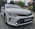 Білий Тойота Камрі, об'ємом двигуна 2.5 л та пробігом 175 тис. км за 13999 $, фото 1 на Automoto.ua