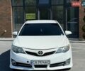 Белый Тойота Камри, объемом двигателя 2.49 л и пробегом 220 тыс. км за 8850 $, фото 1 на Automoto.ua