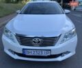 Белый Тойота Камри, объемом двигателя 2.49 л и пробегом 180 тыс. км за 15500 $, фото 2 на Automoto.ua