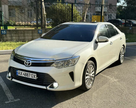 Белый Тойота Камри, объемом двигателя 2.49 л и пробегом 163 тыс. км за 18700 $, фото 1 на Automoto.ua