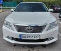 Белый Тойота Камри, объемом двигателя 2.49 л и пробегом 206 тыс. км за 13200 $, фото 1 на Automoto.ua
