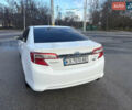 Белый Тойота Камри, объемом двигателя 2.49 л и пробегом 240 тыс. км за 11500 $, фото 3 на Automoto.ua