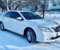 Белый Тойота Камри, объемом двигателя 2.5 л и пробегом 214 тыс. км за 12800 $, фото 2 на Automoto.ua