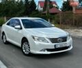 Белый Тойота Камри, объемом двигателя 2.49 л и пробегом 228 тыс. км за 11600 $, фото 1 на Automoto.ua