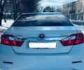 Белый Тойота Камри, объемом двигателя 2.5 л и пробегом 214 тыс. км за 12800 $, фото 4 на Automoto.ua