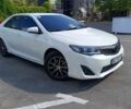 Белый Тойота Камри, объемом двигателя 2.5 л и пробегом 347 тыс. км за 13500 $, фото 1 на Automoto.ua