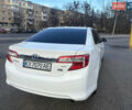 Белый Тойота Камри, объемом двигателя 2.49 л и пробегом 240 тыс. км за 11500 $, фото 4 на Automoto.ua