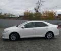 Белый Тойота Камри, объемом двигателя 2.5 л и пробегом 235 тыс. км за 13200 $, фото 11 на Automoto.ua