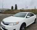 Белый Тойота Камри, объемом двигателя 2.5 л и пробегом 242 тыс. км за 10700 $, фото 1 на Automoto.ua
