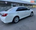 Белый Тойота Камри, объемом двигателя 2.49 л и пробегом 180 тыс. км за 15500 $, фото 1 на Automoto.ua