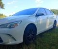 Белый Тойота Камри, объемом двигателя 2.5 л и пробегом 220 тыс. км за 13700 $, фото 2 на Automoto.ua