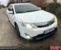 Белый Тойота Камри, объемом двигателя 2.5 л и пробегом 175 тыс. км за 9000 $, фото 1 на Automoto.ua