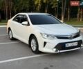 Белый Тойота Камри, объемом двигателя 2.49 л и пробегом 200 тыс. км за 13900 $, фото 1 на Automoto.ua