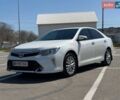 Белый Тойота Камри, объемом двигателя 2.5 л и пробегом 169 тыс. км за 16200 $, фото 1 на Automoto.ua