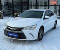 Белый Тойота Камри, объемом двигателя 2.49 л и пробегом 230 тыс. км за 11000 $, фото 1 на Automoto.ua