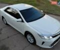 Белый Тойота Камри, объемом двигателя 2.5 л и пробегом 137 тыс. км за 16800 $, фото 1 на Automoto.ua