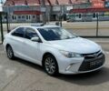 Белый Тойота Камри, объемом двигателя 2.49 л и пробегом 204 тыс. км за 12990 $, фото 1 на Automoto.ua