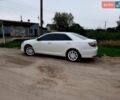 Белый Тойота Камри, объемом двигателя 2.5 л и пробегом 161 тыс. км за 18500 $, фото 1 на Automoto.ua