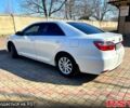 Белый Тойота Камри, объемом двигателя 2.5 л и пробегом 240 тыс. км за 15500 $, фото 1 на Automoto.ua