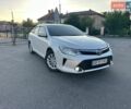 Белый Тойота Камри, объемом двигателя 2.49 л и пробегом 234 тыс. км за 14200 $, фото 1 на Automoto.ua
