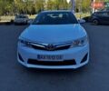 Белый Тойота Камри, объемом двигателя 2.49 л и пробегом 219 тыс. км за 8700 $, фото 1 на Automoto.ua