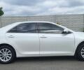 Белый Тойота Камри, объемом двигателя 2.5 л и пробегом 205 тыс. км за 16800 $, фото 1 на Automoto.ua
