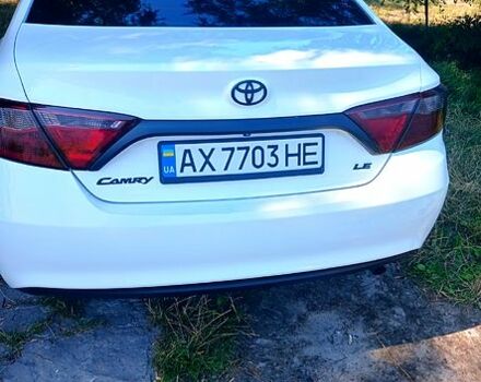 Белый Тойота Камри, объемом двигателя 2.5 л и пробегом 220 тыс. км за 13700 $, фото 1 на Automoto.ua
