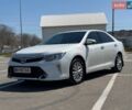 Белый Тойота Камри, объемом двигателя 2.5 л и пробегом 169 тыс. км за 16200 $, фото 1 на Automoto.ua