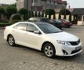 Белый Тойота Камри, объемом двигателя 2.5 л и пробегом 140 тыс. км за 11700 $, фото 1 на Automoto.ua