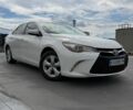 Белый Тойота Камри, объемом двигателя 2.5 л и пробегом 240 тыс. км за 12900 $, фото 1 на Automoto.ua