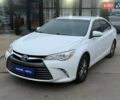 Белый Тойота Камри, объемом двигателя 2.49 л и пробегом 230 тыс. км за 11900 $, фото 1 на Automoto.ua
