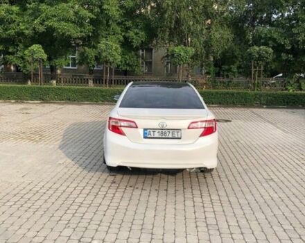 Белый Тойота Камри, объемом двигателя 2.5 л и пробегом 140 тыс. км за 11700 $, фото 3 на Automoto.ua