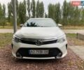Белый Тойота Камри, объемом двигателя 2.49 л и пробегом 235 тыс. км за 13600 $, фото 1 на Automoto.ua