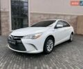Белый Тойота Камри, объемом двигателя 2.5 л и пробегом 124 тыс. км за 16700 $, фото 1 на Automoto.ua