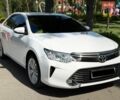 Белый Тойота Камри, объемом двигателя 2.49 л и пробегом 165 тыс. км за 18500 $, фото 1 на Automoto.ua