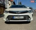 Белый Тойота Камри, объемом двигателя 2.49 л и пробегом 180 тыс. км за 14000 $, фото 1 на Automoto.ua