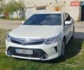 Белый Тойота Камри, объемом двигателя 2.49 л и пробегом 185 тыс. км за 17300 $, фото 1 на Automoto.ua
