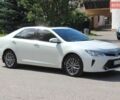 Белый Тойота Камри, объемом двигателя 2.49 л и пробегом 205 тыс. км за 15999 $, фото 1 на Automoto.ua