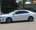 Белый Тойота Камри, объемом двигателя 2.49 л и пробегом 205 тыс. км за 15999 $, фото 1 на Automoto.ua