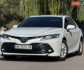 Белый Тойота Камри, объемом двигателя 2.49 л и пробегом 158 тыс. км за 17800 $, фото 1 на Automoto.ua