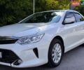 Белый Тойота Камри, объемом двигателя 2.49 л и пробегом 175 тыс. км за 16700 $, фото 1 на Automoto.ua