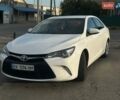 Белый Тойота Камри, объемом двигателя 2.5 л и пробегом 191 тыс. км за 13000 $, фото 1 на Automoto.ua