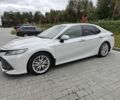 Белый Тойота Камри, объемом двигателя 2.5 л и пробегом 222 тыс. км за 19407 $, фото 1 на Automoto.ua