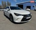 Белый Тойота Камри, объемом двигателя 2.5 л и пробегом 158 тыс. км за 14900 $, фото 1 на Automoto.ua